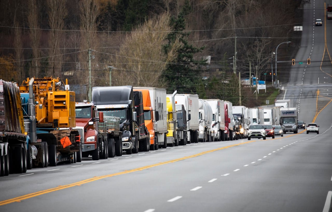 A long line of shipping trucks.